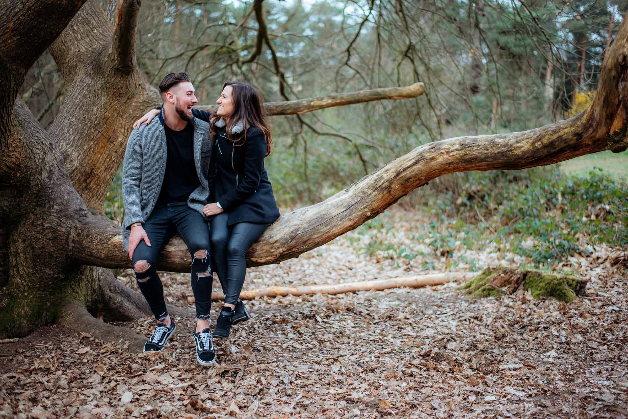Fun engagement couples photoshoot in the Chantries Woods Guildford