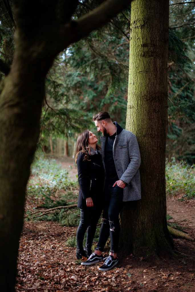Newly engaged couple in Chantries wood, Guildford