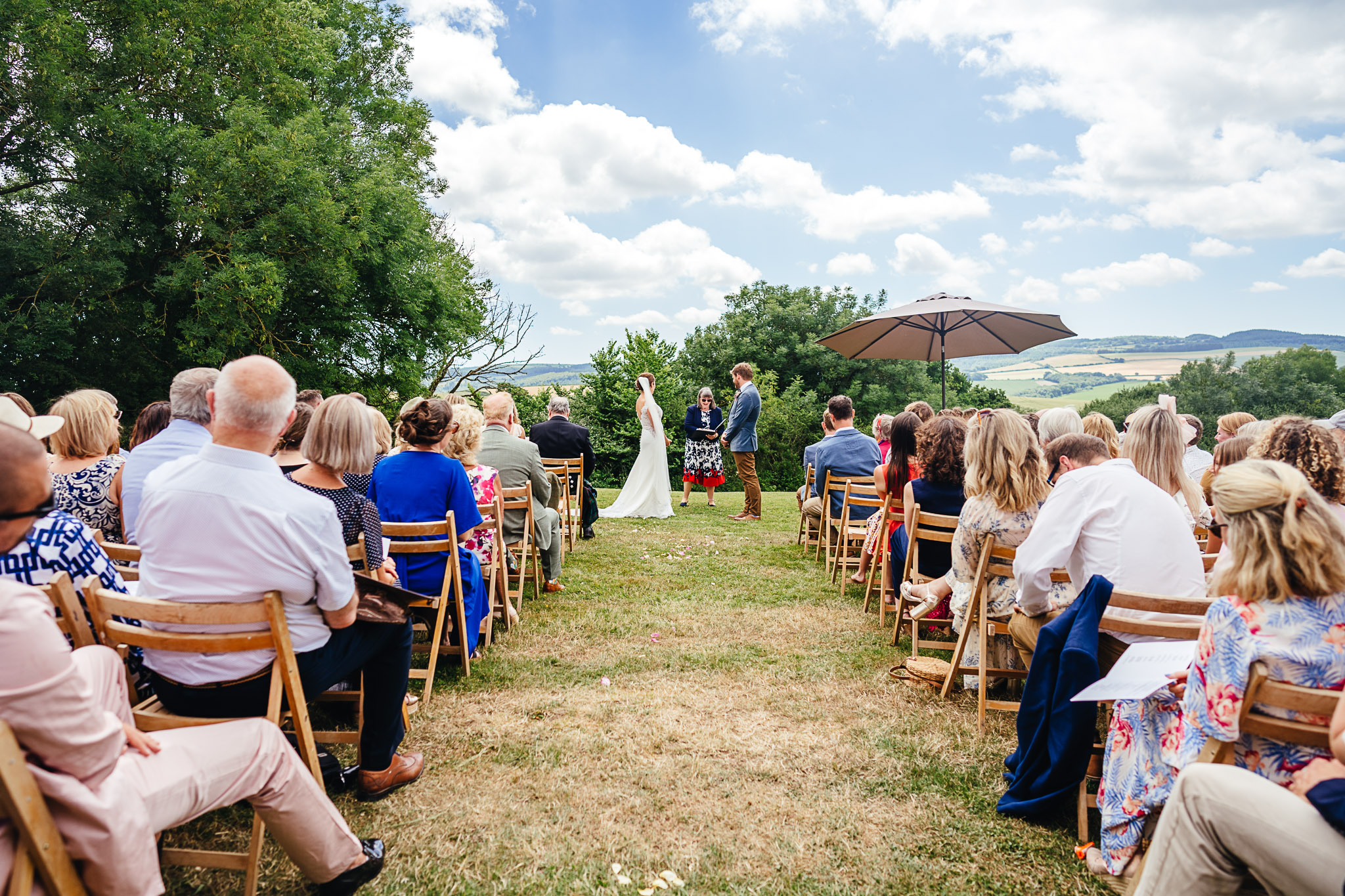 Higher Eggbeer Farm wedding ceremony captured by Devon wedding photographer