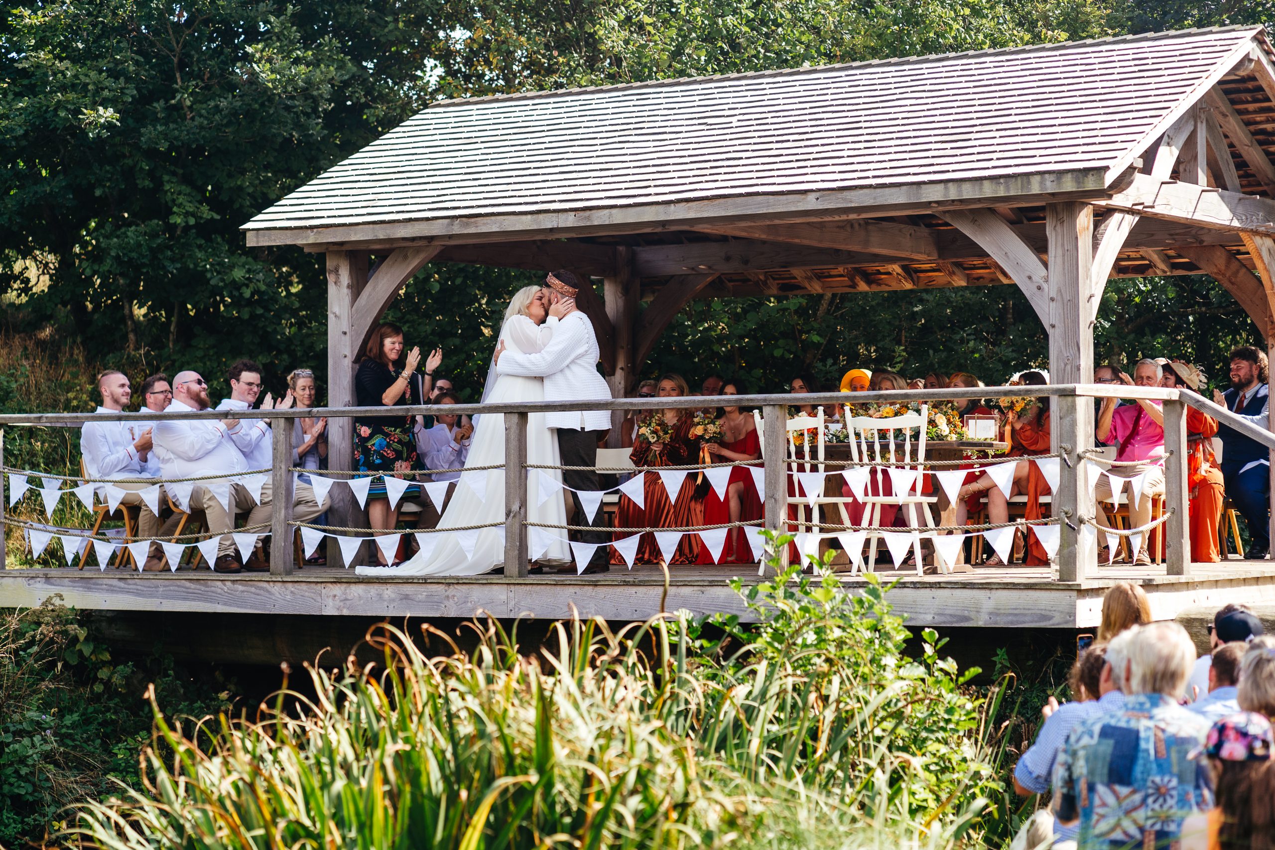Clifford Barton Devon wedding photographer outdoor lake ceremony